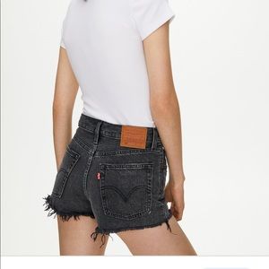 Levi’s mid rise black cut off shorts